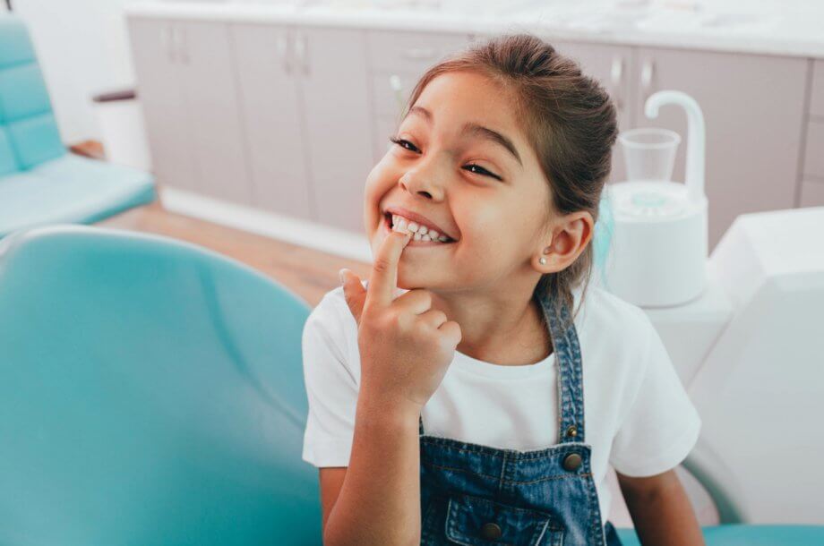 young girl at the dentist